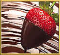 A strawberry oozing yummy Belgian chocolate - the chocolate fountain is indulence in its most decadent form 