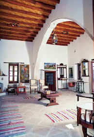 High wooden beamed ceilings and stone flagged floors, the proper way to build for the climate in Cyprus.